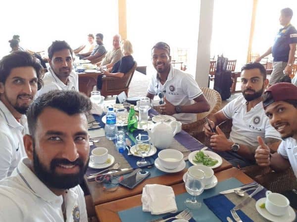 Cheteshwar Pujara eating food