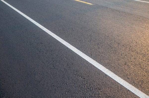 What Do Solid White Lines On A Road Mean