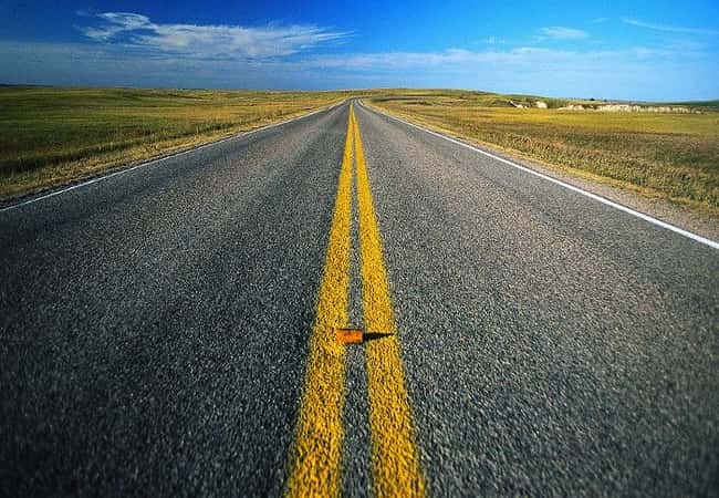 two yellow lines on highway